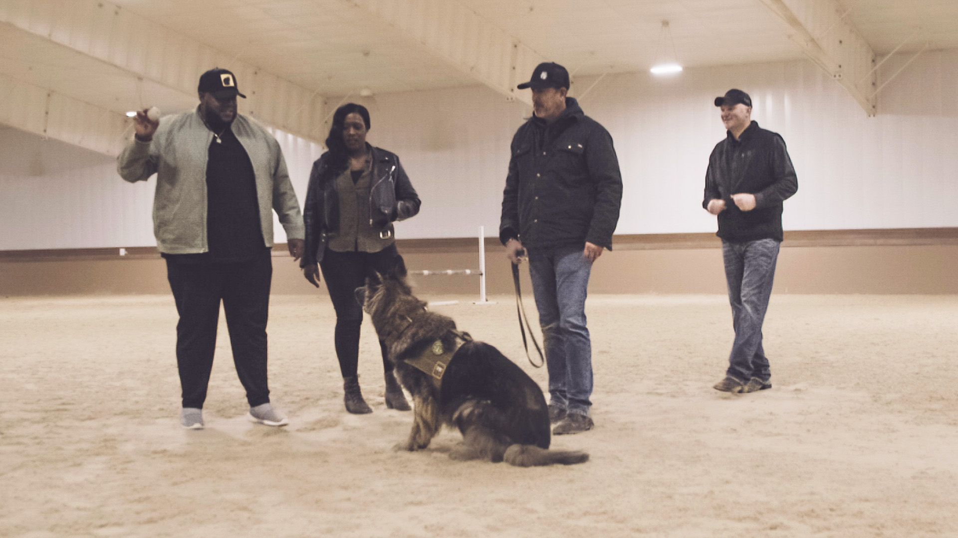 Michael Trotter, Tanya Trotter, John Guthrie, Jason Johnson training with K-9 Klara