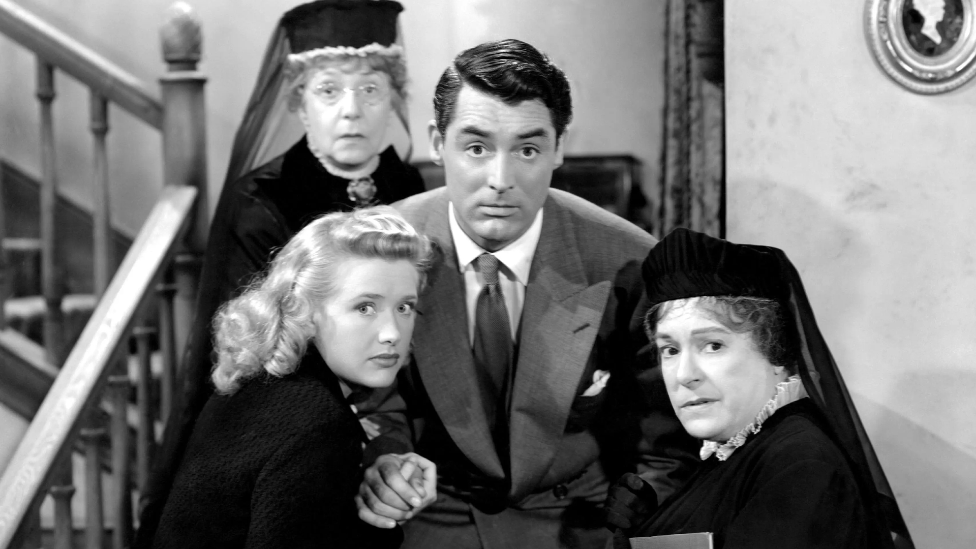 Characters from the film including Cary Grant.