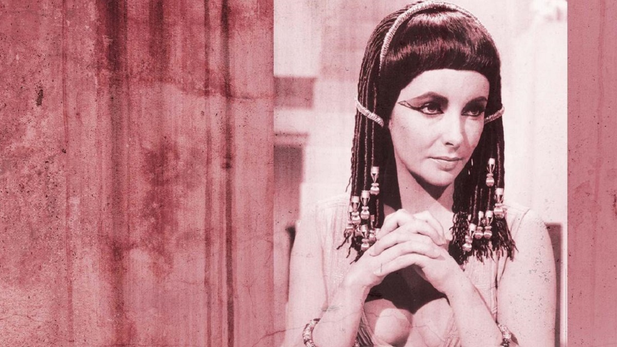 Elizabeth Taylor as Cleopatra on a pink background