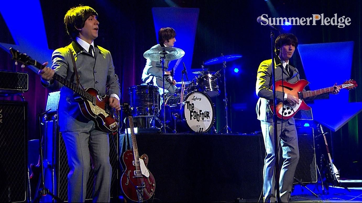 The Fab Four Beatles tribute band on stage