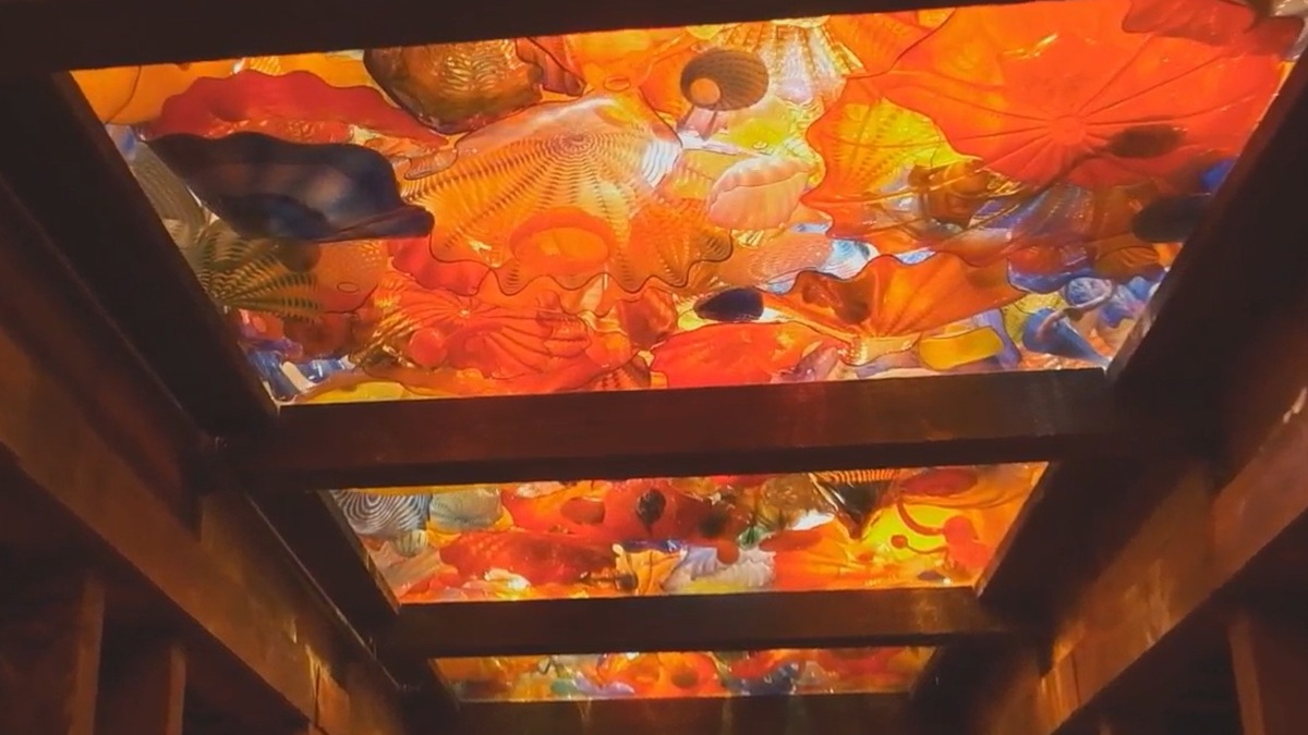 A colorful, swirling glass ceiling in a barrel house at Makers Mark Distillery