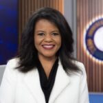 Renee Shaw smiling on a KET set