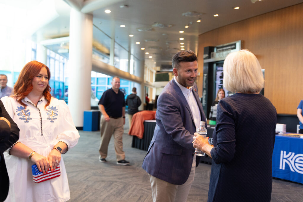Dr. Benjamin Gies, Chair of the America 250 Louisville Committee, greeting Julie Schmidt, KET's Senior Director, External Affairs