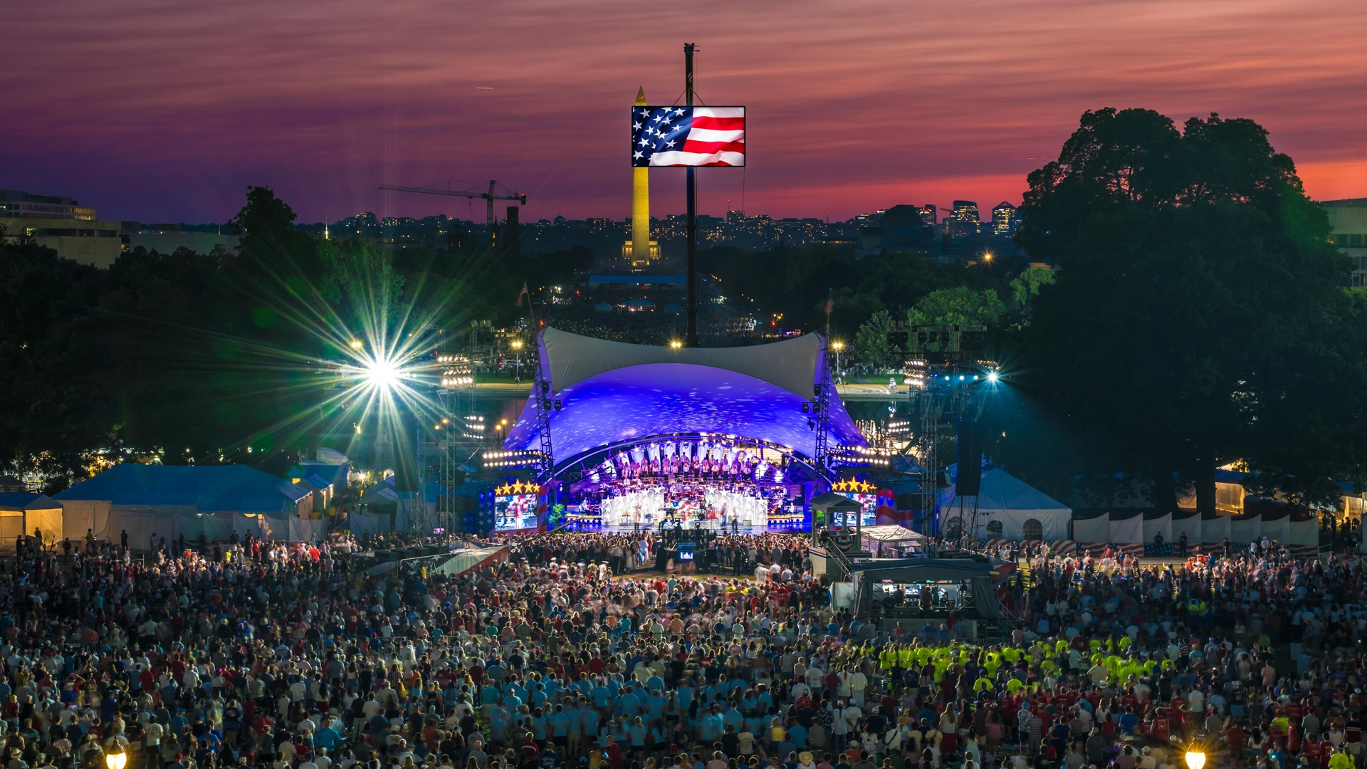 aerial view of the orchestra shell and crowd at concert