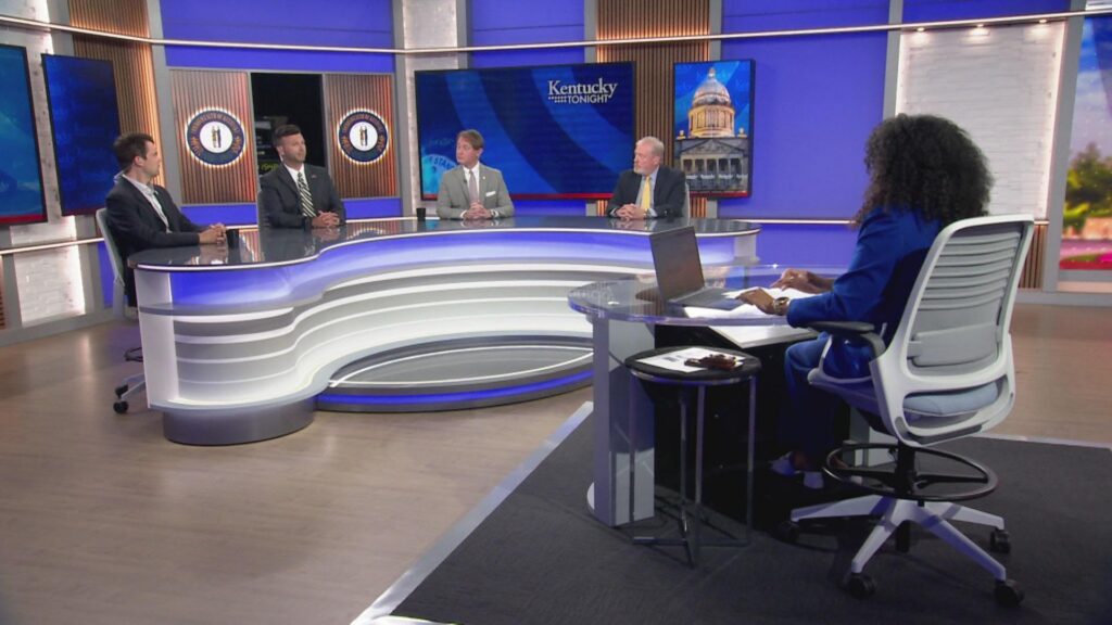 Host Renee Shaw on set with guests.