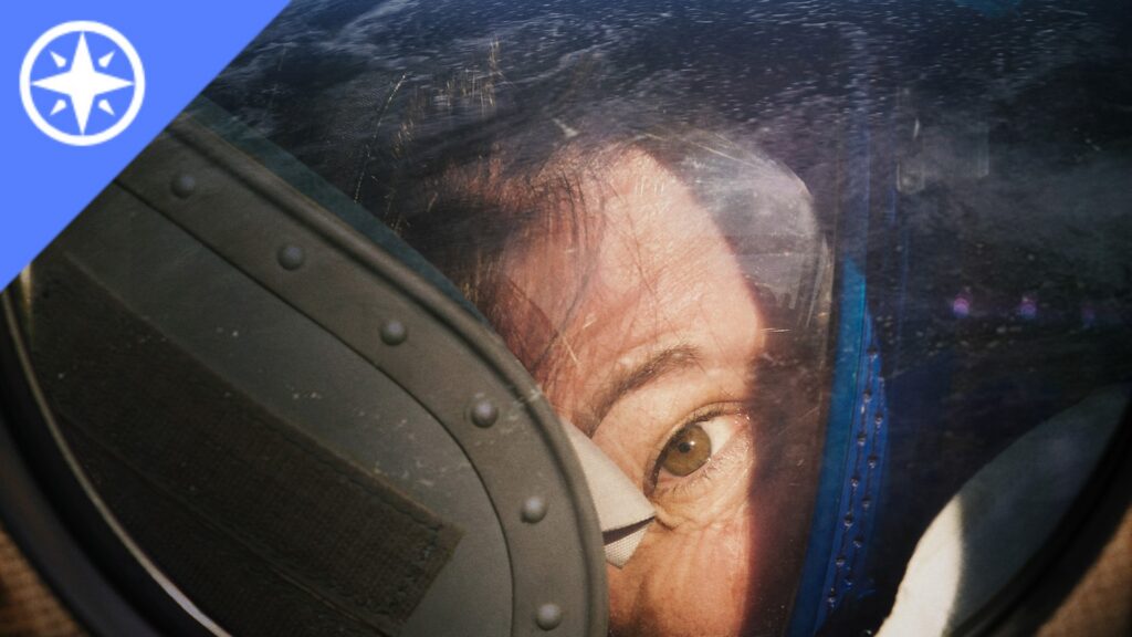 An astronaut looking out a spaceship window along with the KET Passport logo