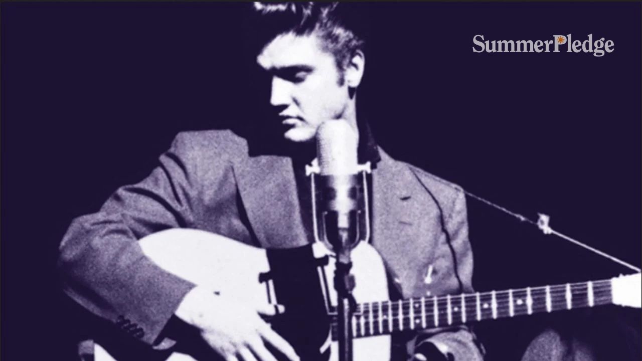 Black and white photo of young Elvis on guitar