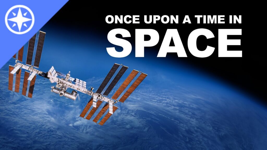 The International Space Station (ISS), a massive orbiting research laboratory composed of multiple modules and solar arrays, floating in space with the Earth behind in. The program title is superimposed over the image.
