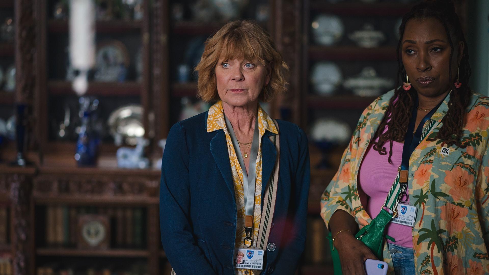 Judith and Suzie looking serious