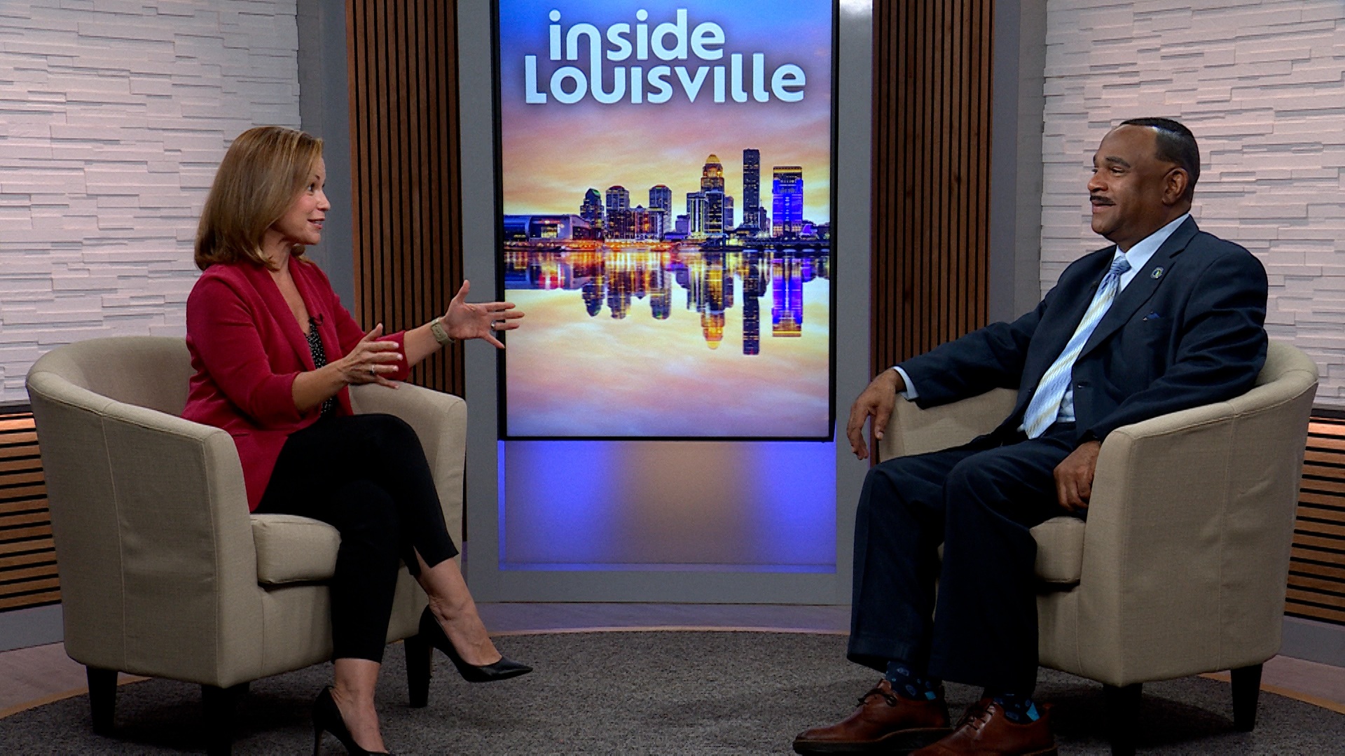 Kelsey Starks sits opposite a MSD representative on the Inside Louisville set
