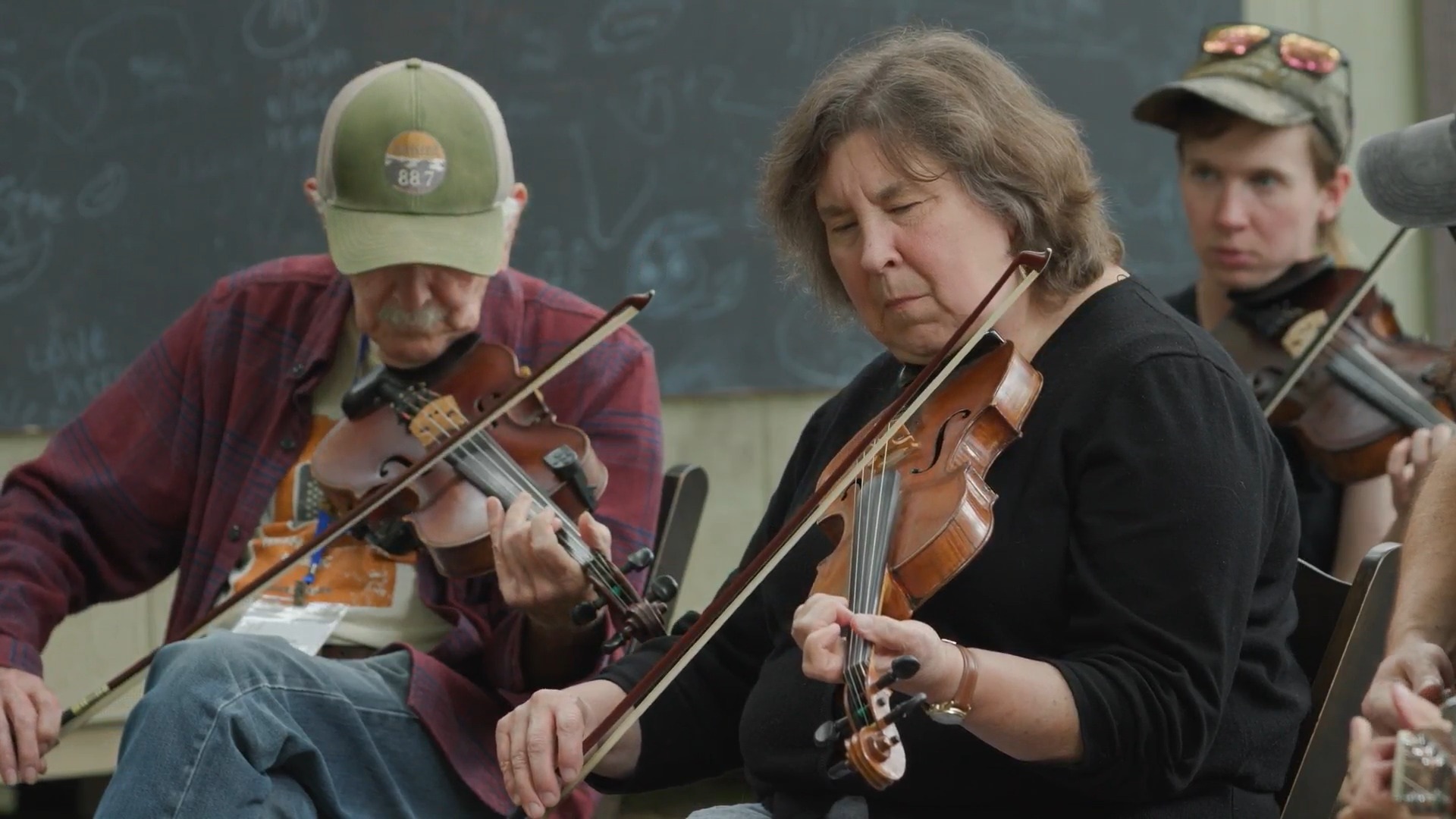 Three fiddle players at cowan creek